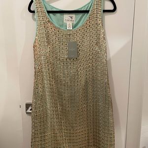 Beautiful cocktail dress! Knee length. Gold Sequins. Brand new. Gold-ish